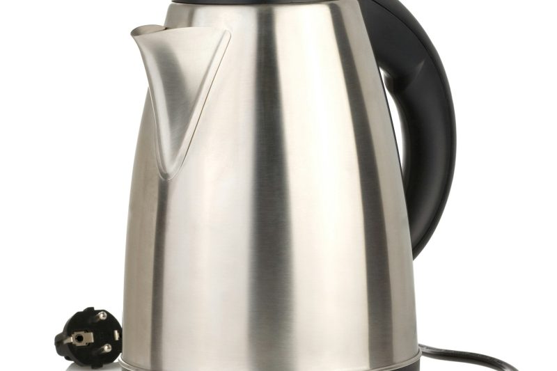 stainless electric kettle isolated on white